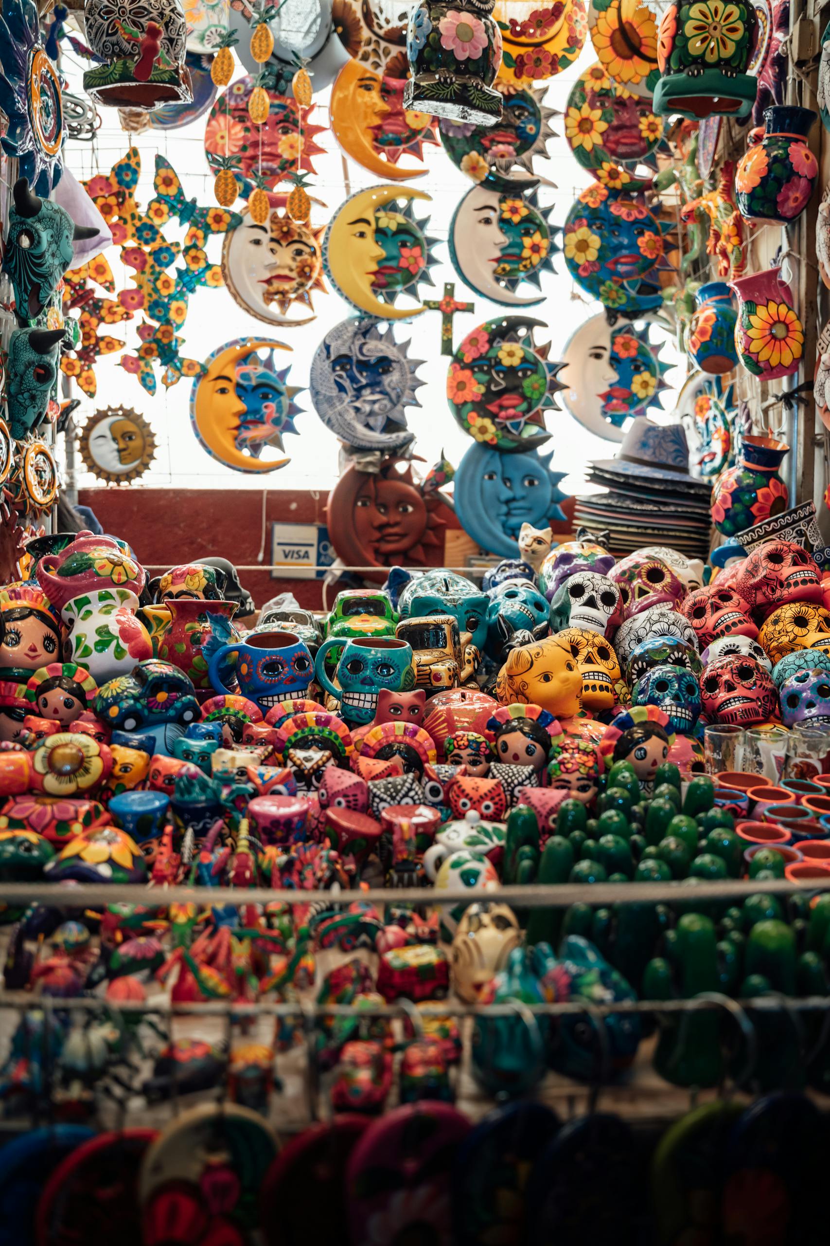 Explore vibrant handcrafted pottery and souvenirs at a market in Ciudad de México, Mexico.