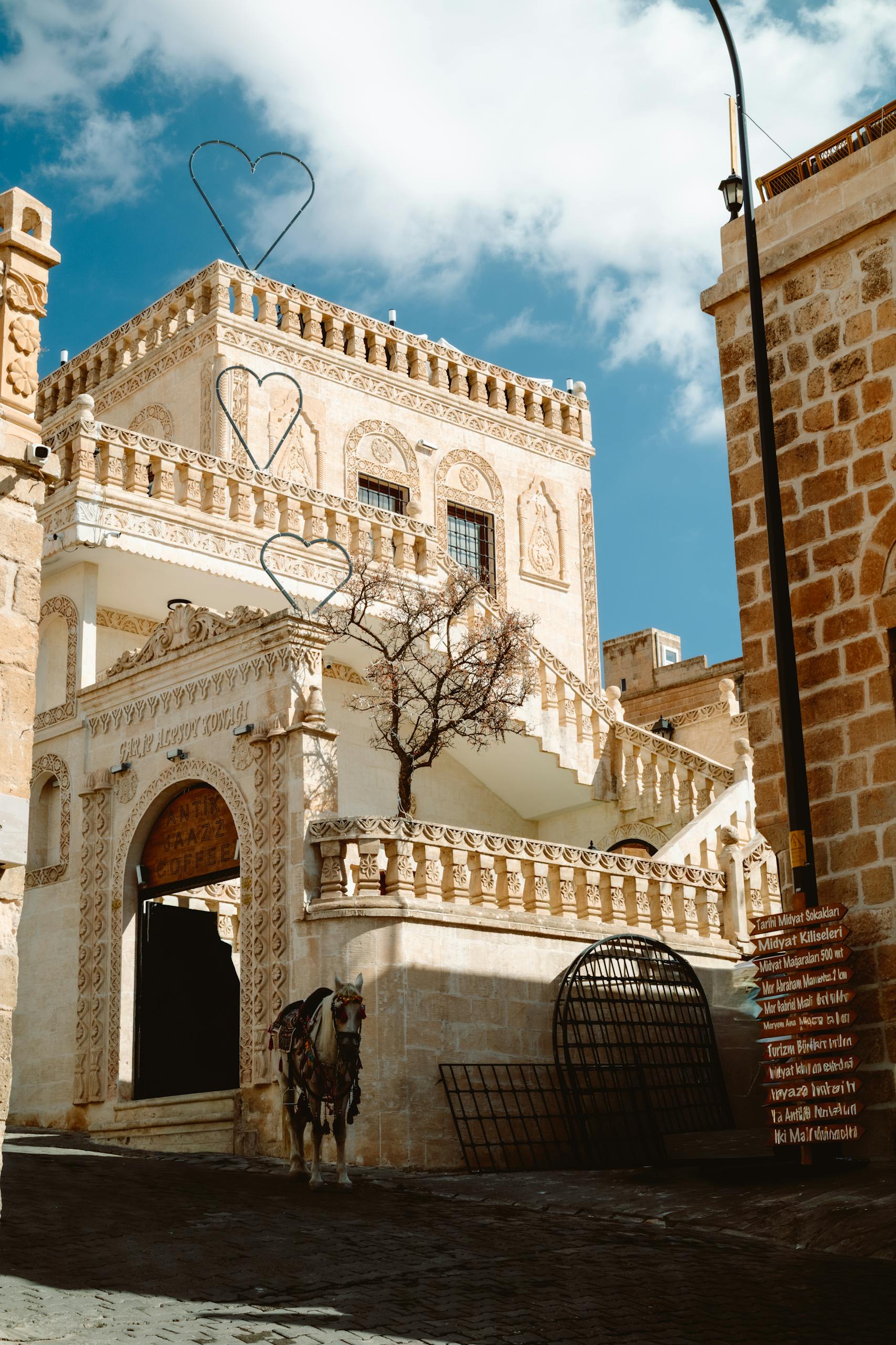 Beautiful Middle Eastern architecture with intricate carvings on a sunny day.