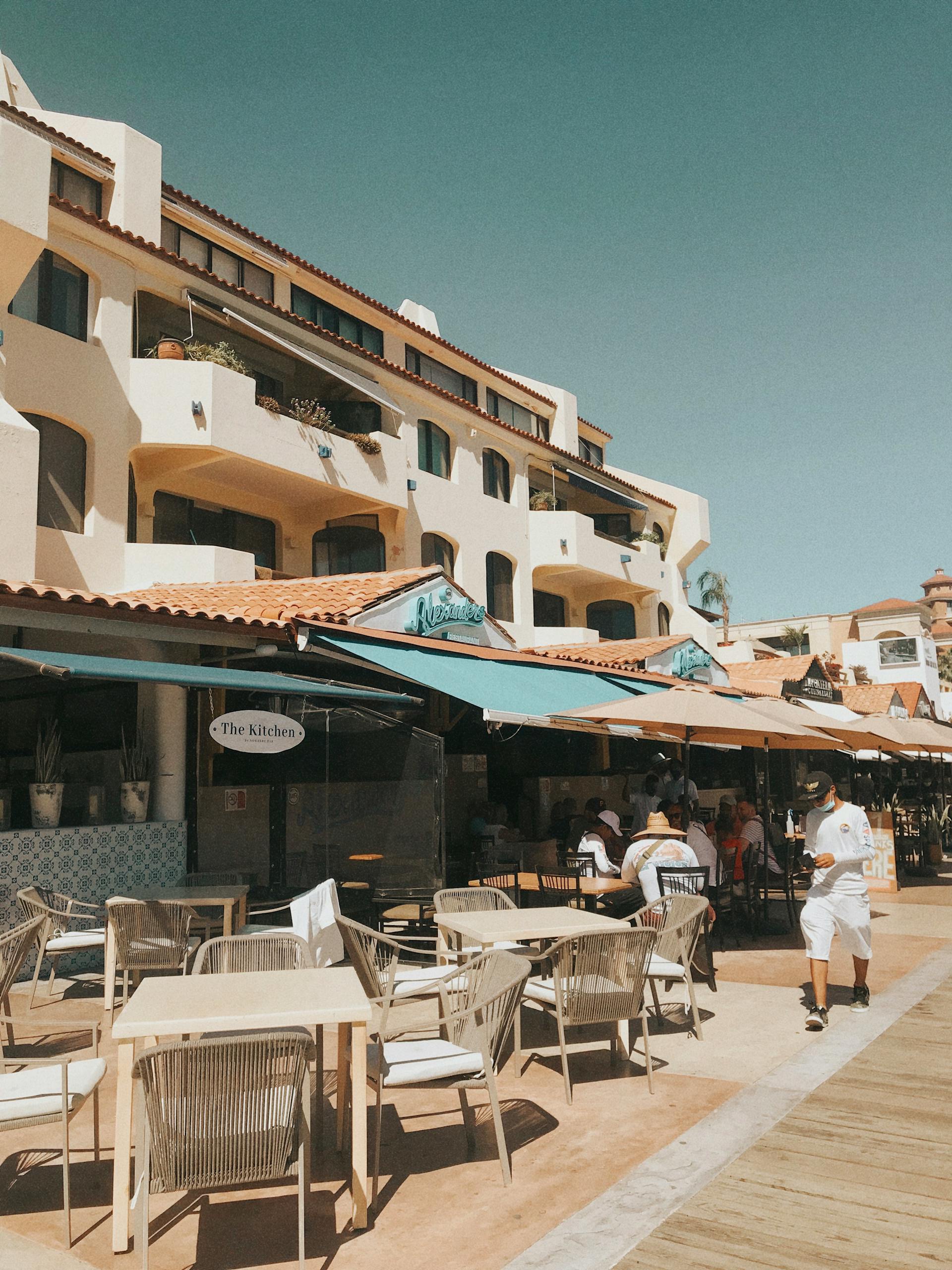 Relax at a sunny patio at a hotel with restaurants in Cabo San Lucas, Mexico.